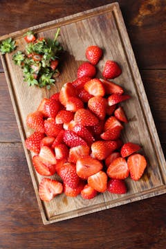 strawberries stalks removed and cut into halves 