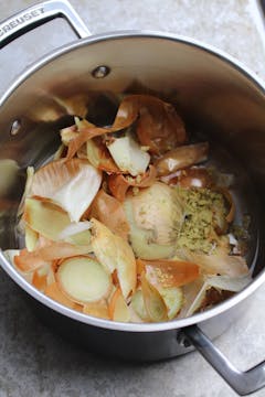 onion peels in a saucepan, with water and vegetable stocks