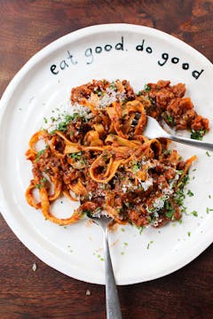 fennel and walnut bolognese on a white plate 