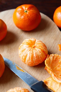 clementines on chopping board 