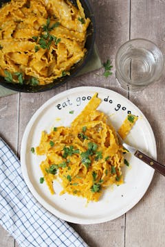 plate of vegan roasted bell pepper pasta served with parsley