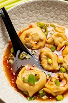 served wonton soup in a bowl