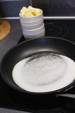 Sugar being melted in a pan. 