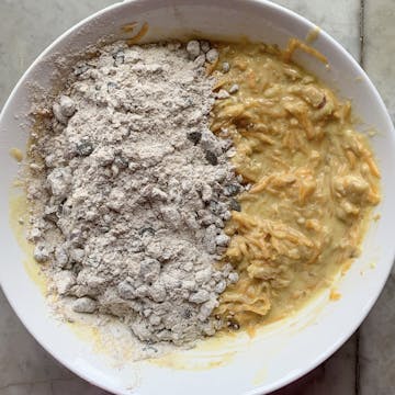 rolled oats and other ingredients added to egg mixture