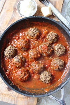 meatball added to the tomato sauce