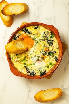 Chard and chickpea bake, fresh out the oven! With a slice of crusty bread to serve. 