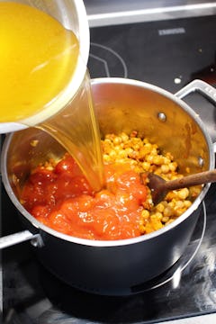 image of soup ingredients being mixed in a pan