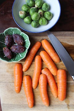 Carrots in chopping board