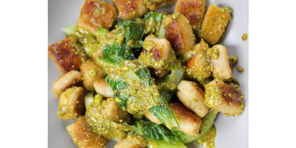 Cauliflower gnocchi topped with pistachio pesto 