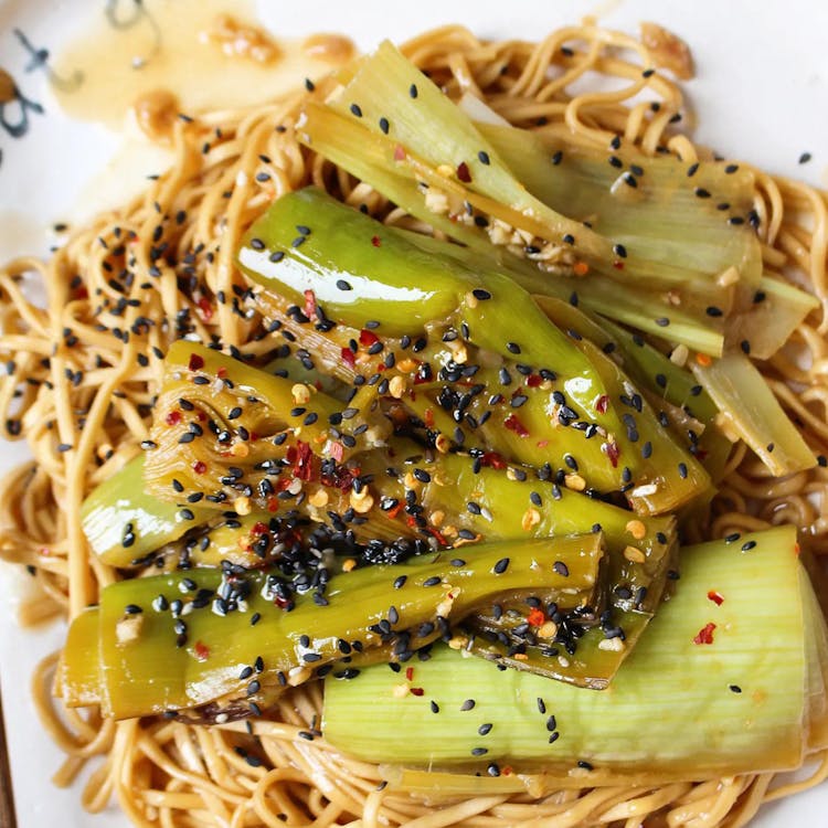 miso braised leeks on a bed of noodles