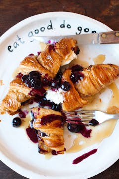 blueberry croissants on a white plate