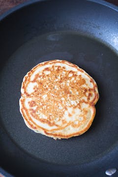 pancake cooking in frying pan 