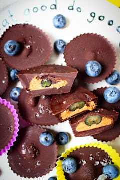 bunch of frozen blueberry and peanut butter cups