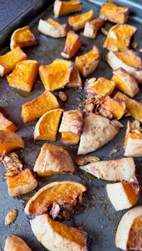 roasted butternut squash on a baking tray 
