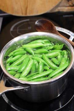 peas submerged in boiling water