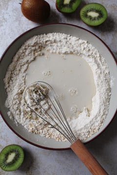 in bowl, flour and oat milk