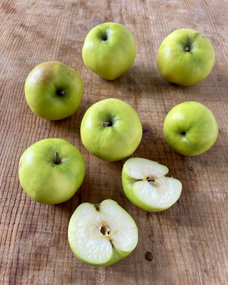 Green lilibet apples on a table