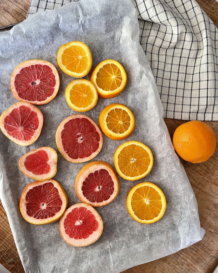 Oranges and grapefruit on a baking tray
