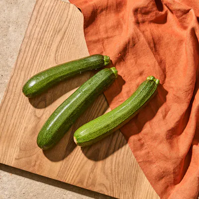 Courgette on a chopping board.