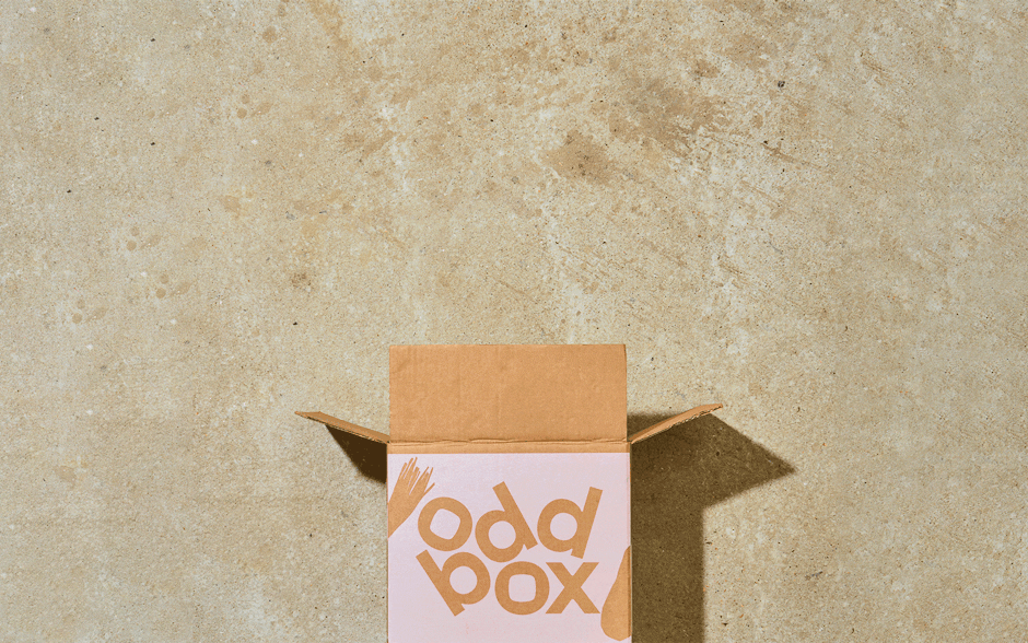 GIF of fruits and vegetables gradually falling out of an Oddbox.