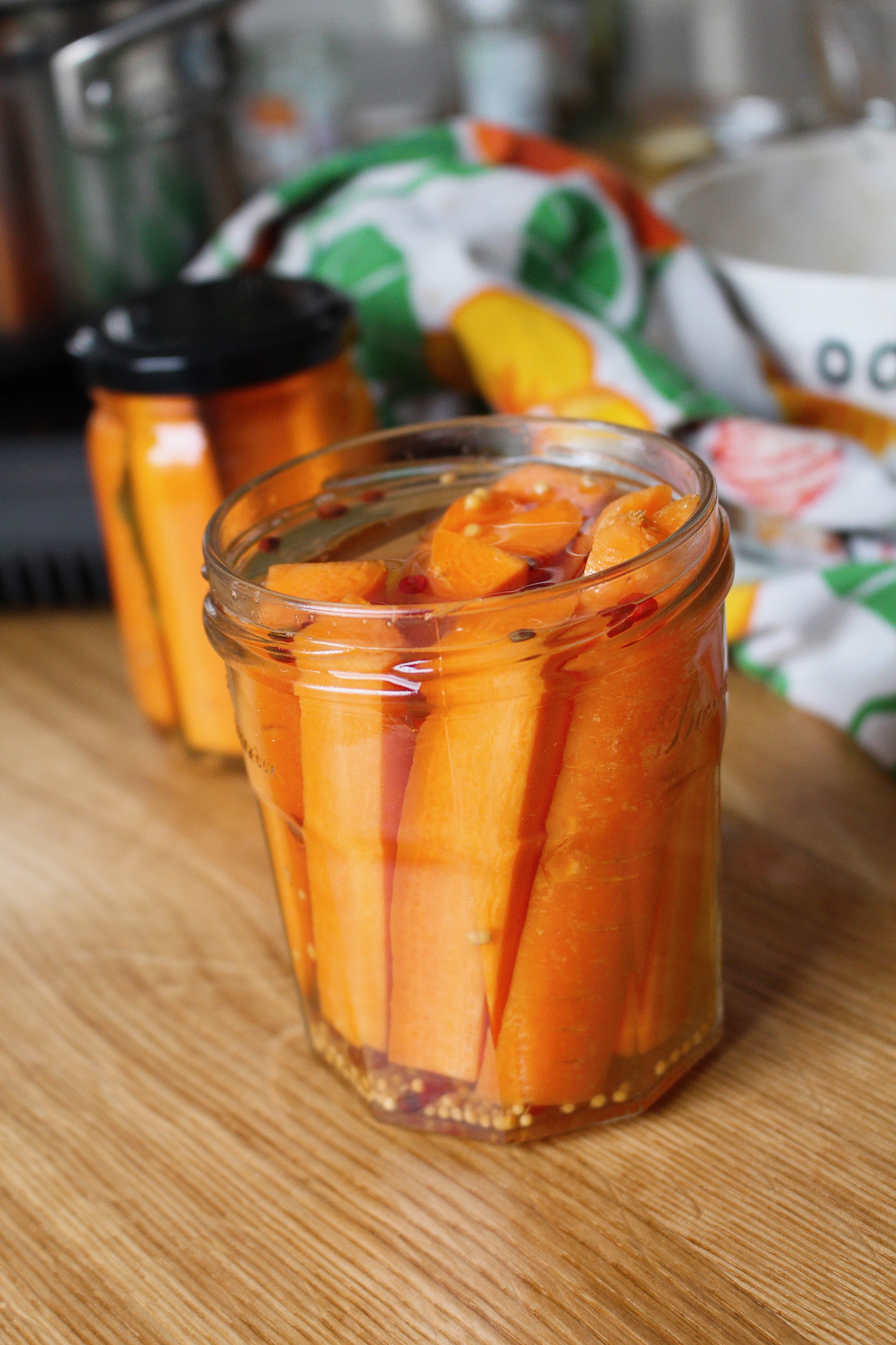 Carrots fermenting in a jar