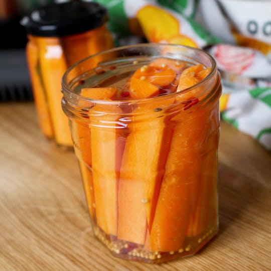 Carrots fermenting in a jar