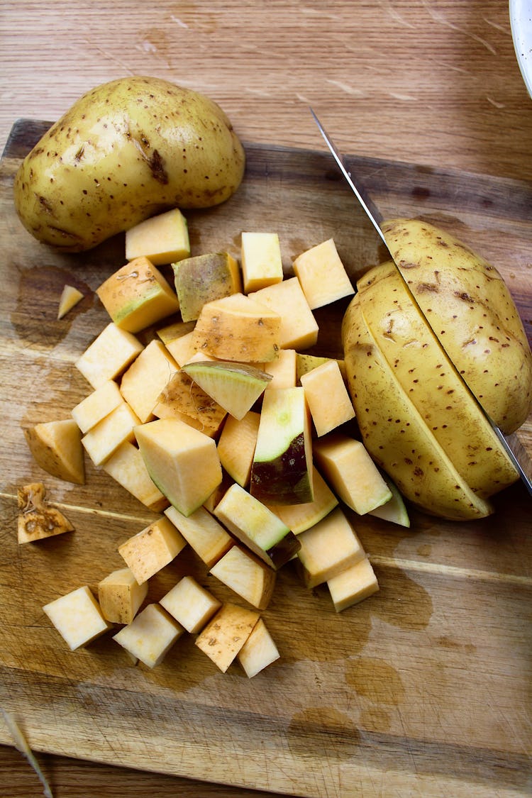 Swede cut up in small pieces with two potatoes