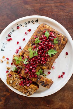 roasted butternut squash nut roast topped with pomegranate seeds