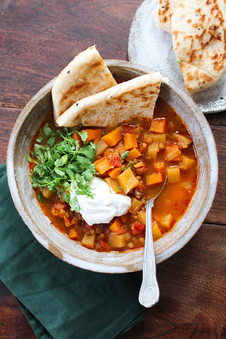 slow cooked moroccan stew served with naan bread