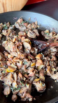 garlic and mushrooms in a frying pan