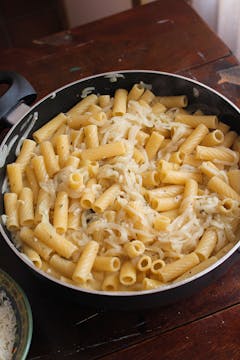 dried pasta added to the pan