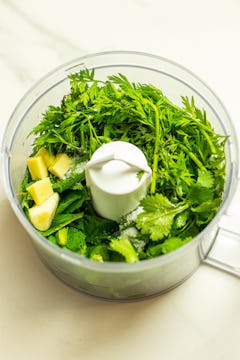 all the fresh herbs and spiced in a food processor 