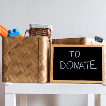 a donate pile on a table