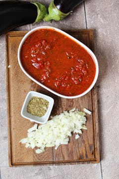 chopped onion, oregano and tomato sauce