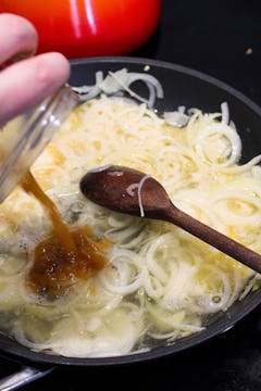 image of onion sauce in frying pan