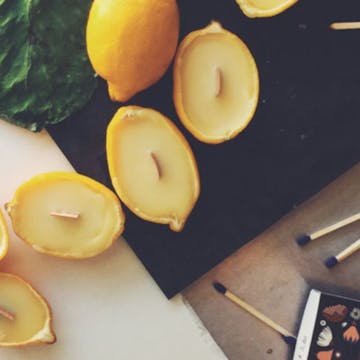 homemade candles in lemon halves