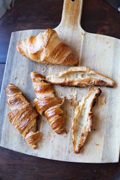 croissants on chopping board