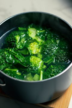 broccoli florets and stalks are getting boiled
