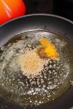 spices in frying pan 