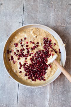 pomegranate seeds are added to the batter