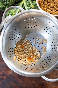 pumpkin seeds in a colander 