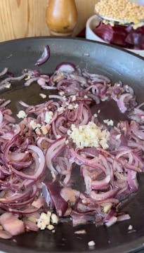 onions being caramelised in a saucepan