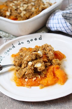 plate with apricot crumble with almond topping