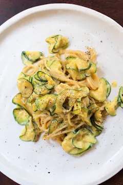 courgette spaghetti on a white plate