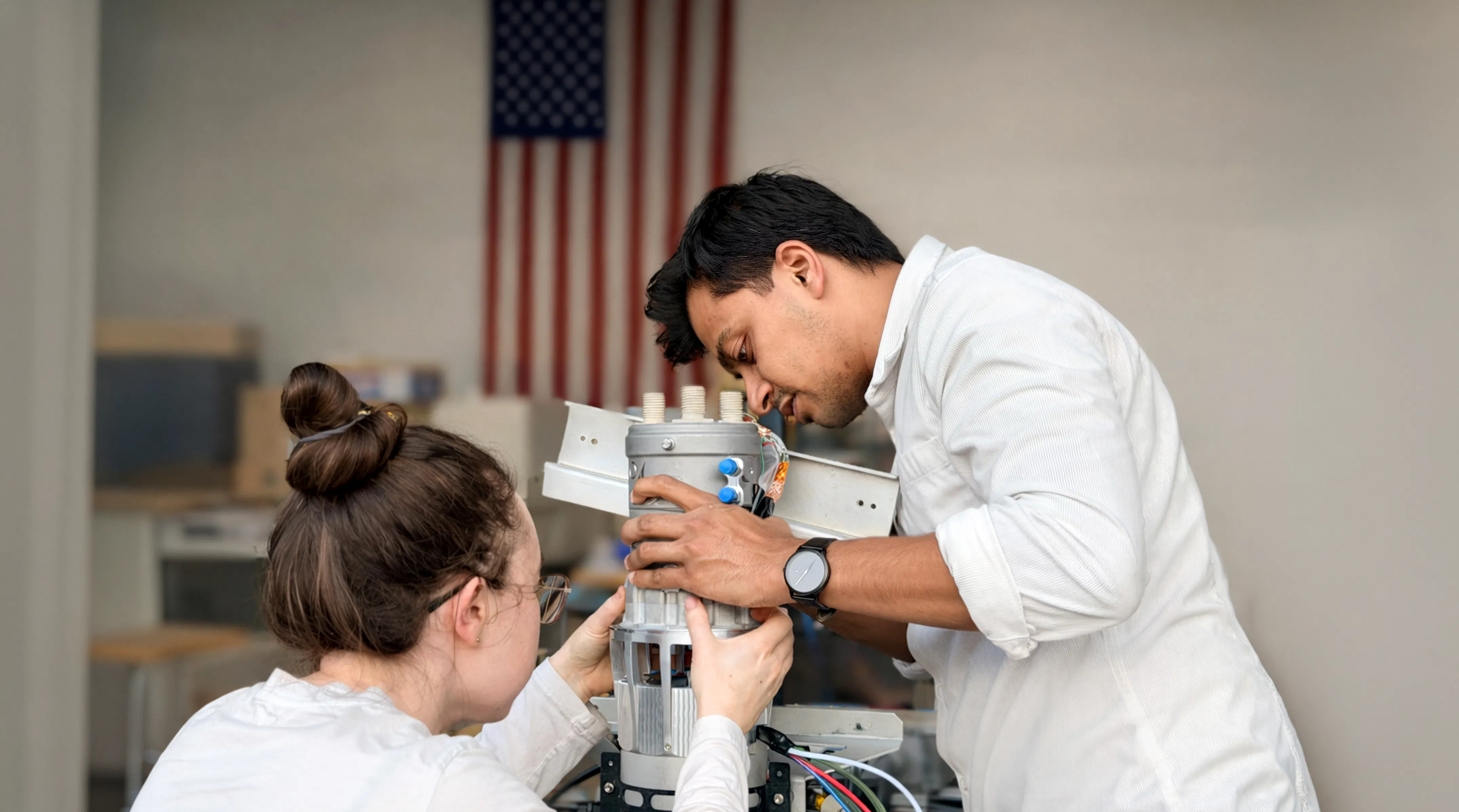 Engineers assembling a 100 kW hybrid propulsion system