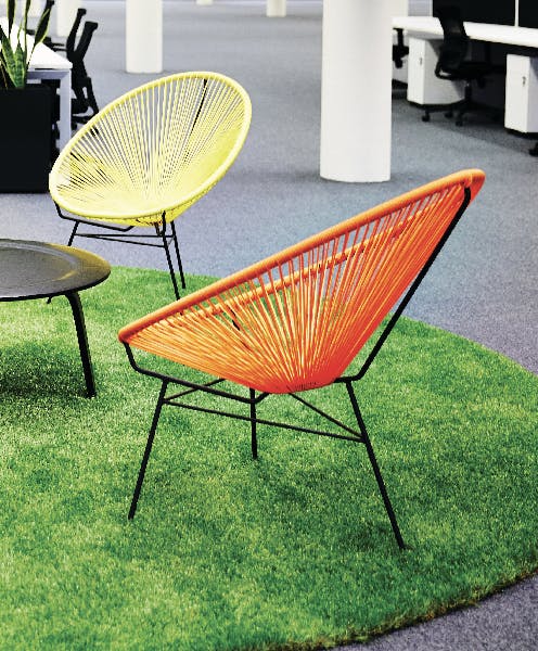 Mondern design chairs on artificial grass