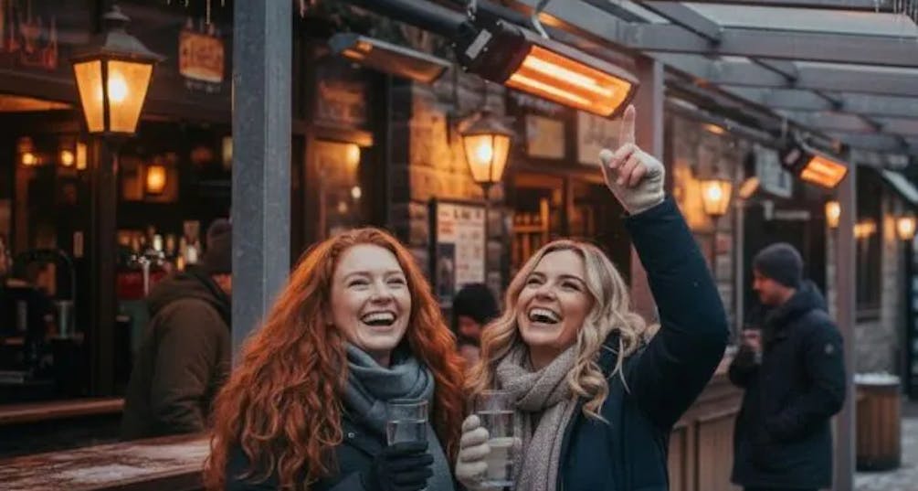 people in outside area with an infared heater