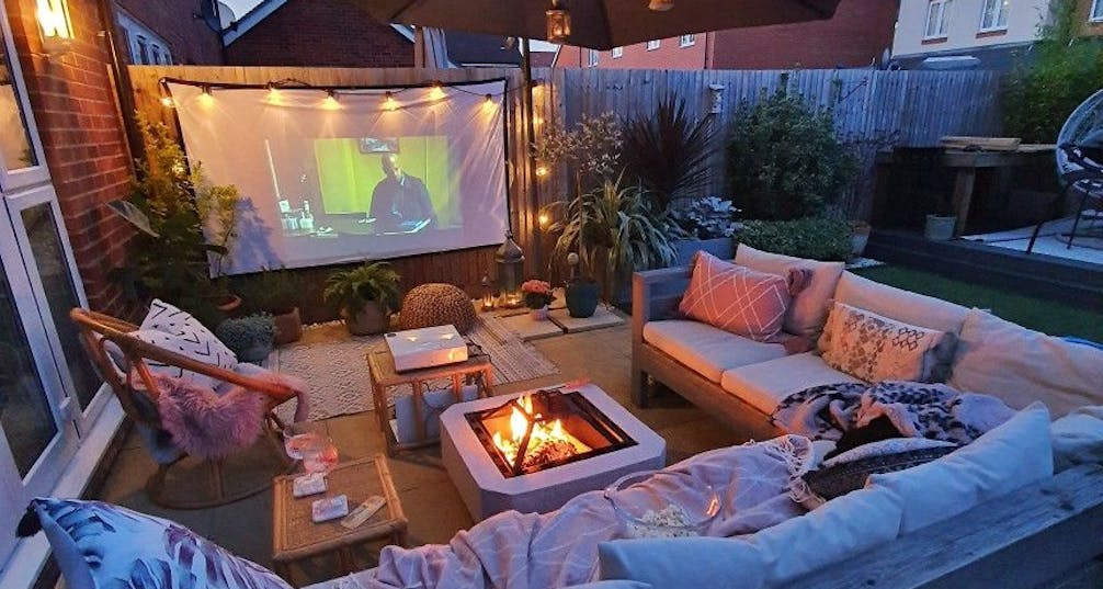 cozy outdoor cinema setup with firepit