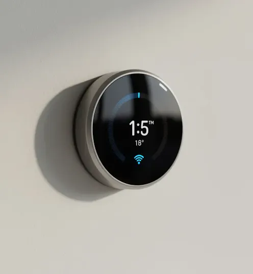 Smart thermostat on wall