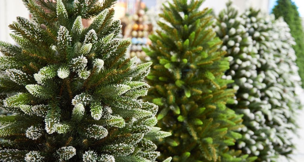 Close up of flocked artificial christmas trees